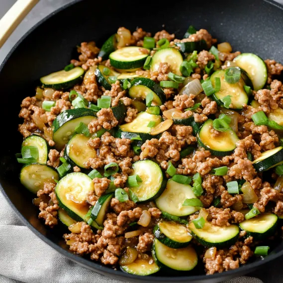 A bowl of meat and vegetables.