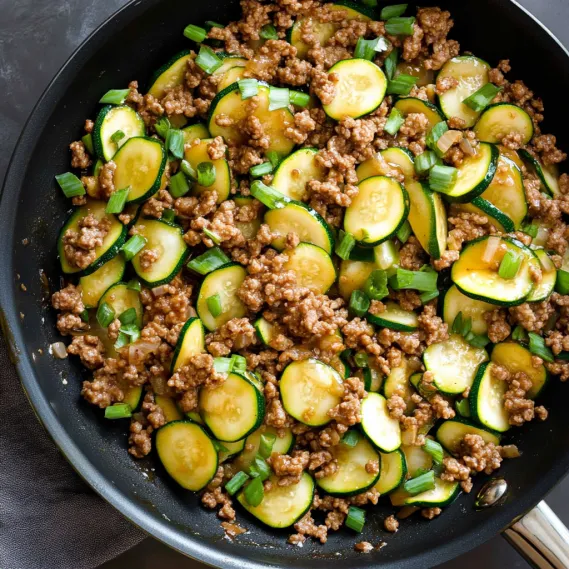 A pan of meat and vegetables.