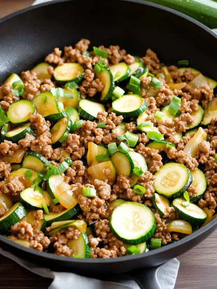 A plate of food with meat and vegetables.