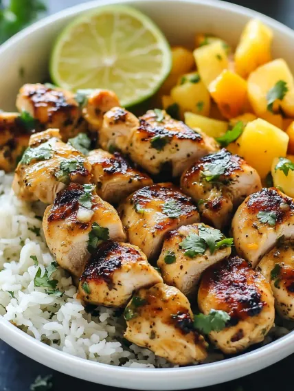 A bowl of rice and chicken.