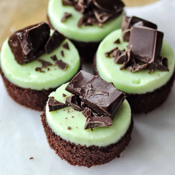 Chocolate and green cupcakes with chocolate chips.