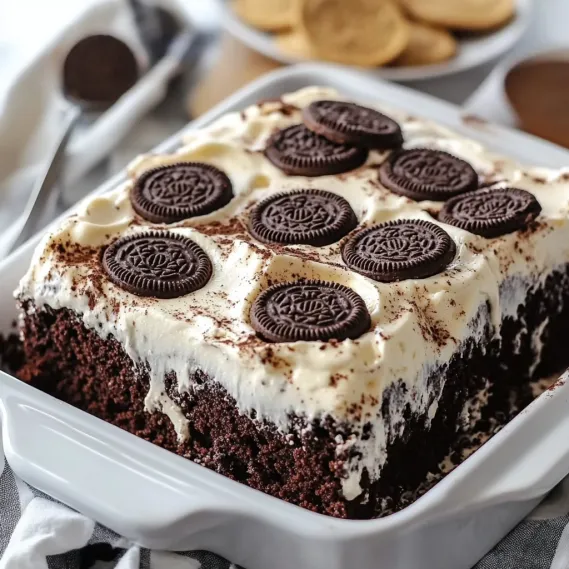 A white plate with a slice of cake on it.