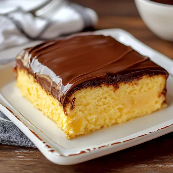 A slice of chocolate cake on a plate.