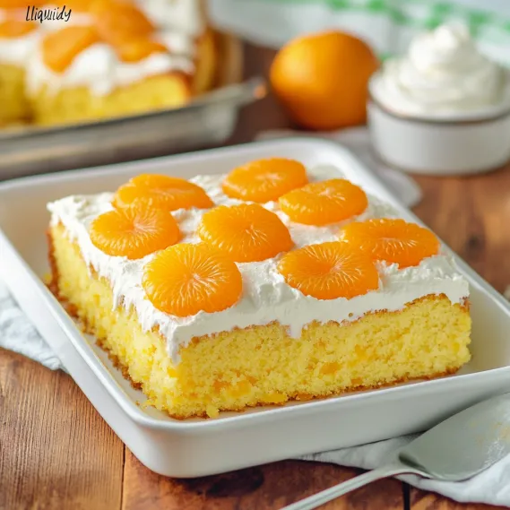A cake with orange slices on top.