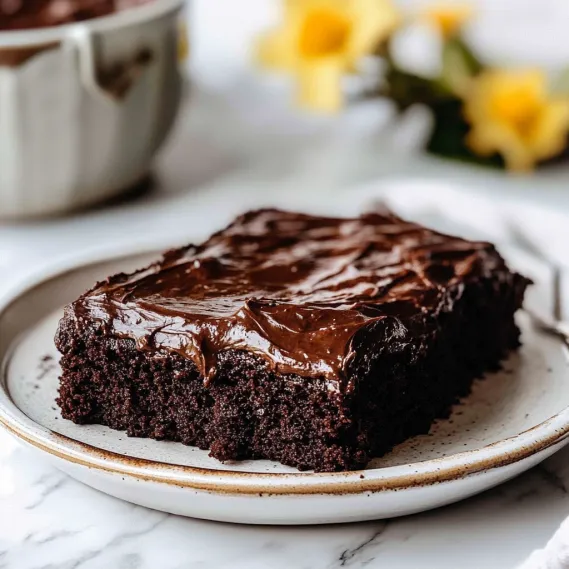 A chocolate cake on a plate.